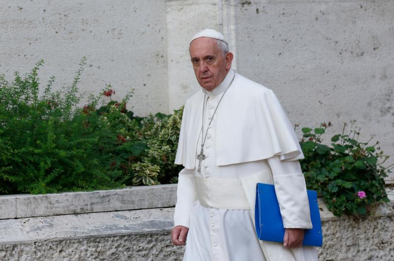 Pope Francis arrives for morning session of Synod of Bishops on the family at Vatican